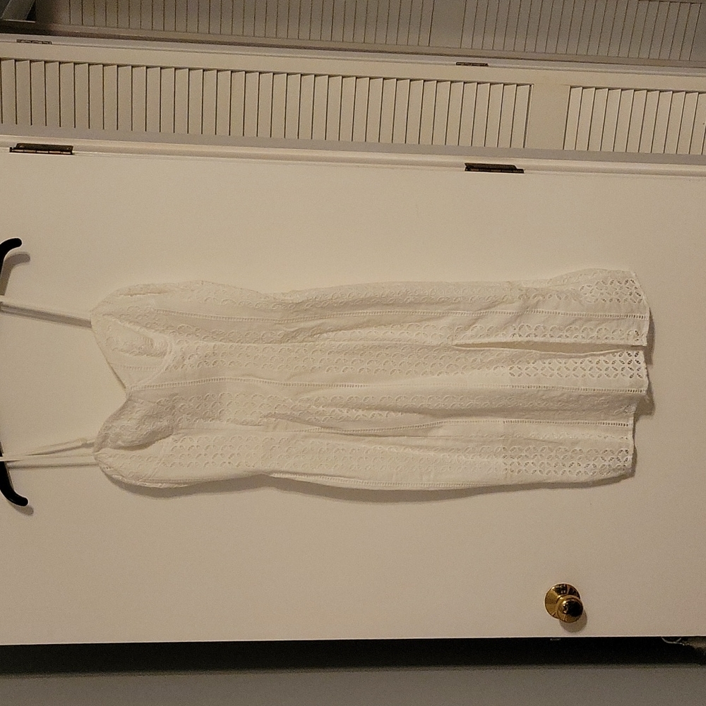 White, mid length, form fitting dress
